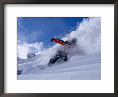 Snowboarder Carving Through Powder Snow, St. Anton Am Arlberg, Tirol, Austria by Christian Aslund Pricing Limited Edition Print image