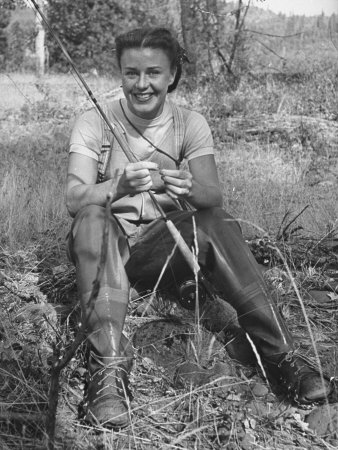 Actress Ginger Rogers Taking A Break From Fly Fishing On Her Ranch In The Rogue River Valley by Bob Landry Pricing Limited Edition Print image