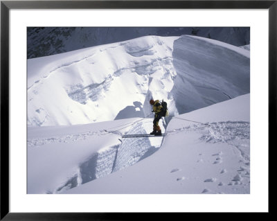 Mountaineer Crossingover A Crevase In The Khumbu Ice Fall, Nepal by Michael Brown Pricing Limited Edition Print image
