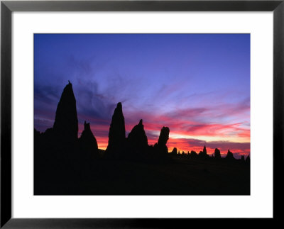 Natural Rocky Formations At Sunset, Pinnacles Desert, Australia by John Banagan Pricing Limited Edition Print image