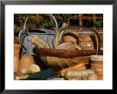 Garden Trug, Metal Watering Can, Terracotta Plant Pots, Hand Tools And Twine On Rustic Table by James Guilliam Pricing Limited Edition Print image