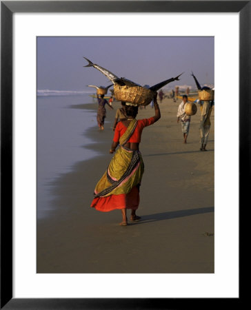 Women Carrying Fish Catch To The Market Of Fishing Village, Puri, Orissa State, India by Jeremy Bright Pricing Limited Edition Print image