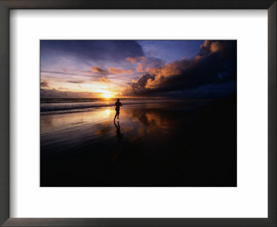 Man Jogging On Seminyak Beach At Sunset Seminyak, Bali, Indonesia by John Borthwick Pricing Limited Edition Print image