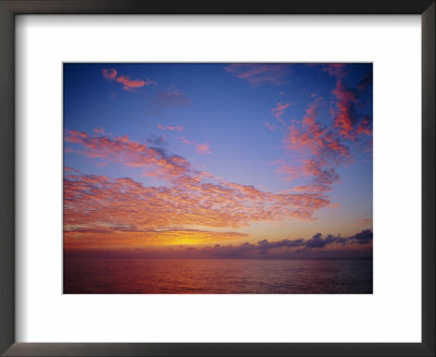 Pink And Orange Clouds At Sunrise Over The English Channel, England, Uk by Ruth Tomlinson Pricing Limited Edition Print image