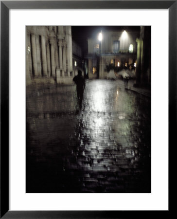 Walking On A Rainy Street At Night by Fogstock Llc Pricing Limited Edition Print image