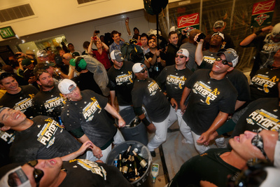 Oakland, Ca - October 1: Oakland Athletics V Texas Ranger - Lockerroom Celebration by Ezra Shaw Pricing Limited Edition Print image