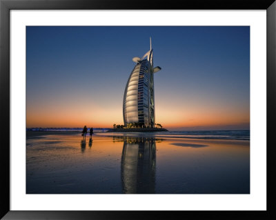 Burj Al Arab Hotel Reflected On Beach At Sunset by Merten Snijders Pricing Limited Edition Print image