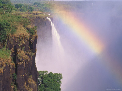 Victoria Falls, Zimbabwe, Rainbow In Misty Falls by Elfi Kluck Pricing Limited Edition Print image