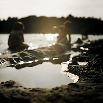 Two People Sitting By The Sea by Jewgeni Roppel Pricing Limited Edition Print image