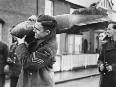 Carrying Away An Unexploded Bomb by Robert Hunt Pricing Limited Edition Print image