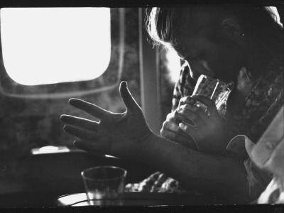 Dancer Karin Von Aroldingen As She Listens To Ballet Master George Balanchine During Flight by Gjon Mili Pricing Limited Edition Print image