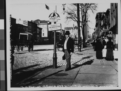 Chemist And Photographer Wallace G. Levison Next To A Sign Advertising Horse Blankets by Wallace G. Levison Pricing Limited Edition Print image