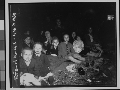 Jewish Prisoners Sitting On Ground At Lambach Concentration Camp Just After Being Liberated by Robert Holliway Pricing Limited Edition Print image