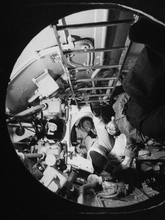 Captain James Hicks And The Quartermaster Climbing Down Into The R-14 Submarine by Carl Mydans Pricing Limited Edition Print image