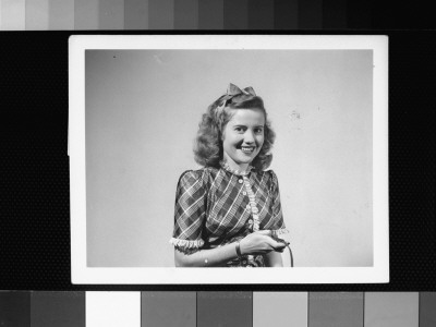 Actress Joyce Reynolds Holding Shutter Release To Take Her Own Photograph by Gjon Mili Pricing Limited Edition Print image