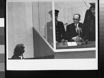 Nazi War Criminal Adolf Eichmann In A Protective Glass Booth While On Trial by Gjon Mili Pricing Limited Edition Print image