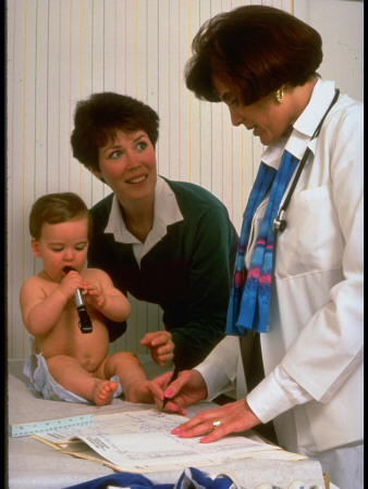 Pediatrician Dr. Linda Bolton With Mother And Baby by Ted Thai Pricing Limited Edition Print image