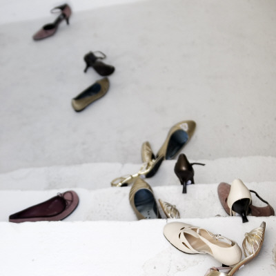 Women's Shoes Scattered Over Some Steps And The Floor by Morgan Norman Pricing Limited Edition Print image