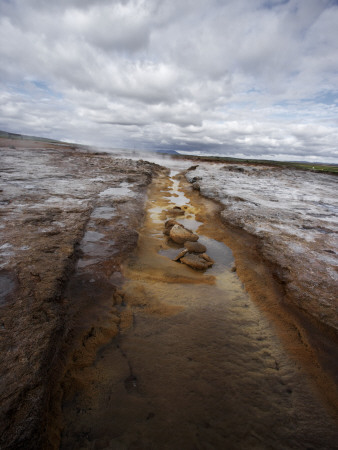 Wet Boulder Around The Geyser Geysir In Iceland by Atli Mar Hafsteinsson Pricing Limited Edition Print image