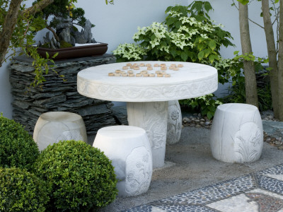 Courtyard With Table And Seating Area Carved From White Stone, Chelsea, Designer: Lesley Bremnes by Clive Nichols Pricing Limited Edition Print image