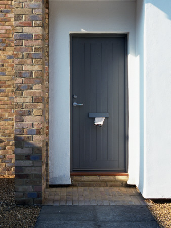 Grey Board Front Door In A Contemporary House With Post, Architect: Chris Rudolph by Richard Bryant Pricing Limited Edition Print image