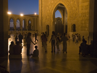 Families Gather At The Mosque Of Hassan Ii by Annie Griffiths Pricing Limited Edition Print image