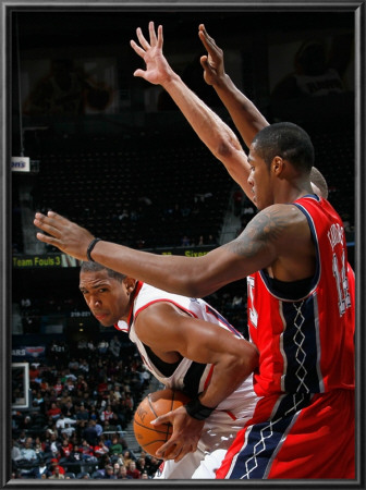 New Jersey Nets V Atlanta Hawks: Al Horford And Derrick Favors by Kevin Cox Pricing Limited Edition Print image