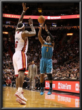 New Orleans Hornets V Miami Heat: Chris Paul And Lebron James by Mike Ehrmann Pricing Limited Edition Print image