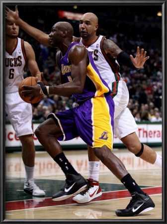 Los Angeles Lakers V Milwaukee Bucks: Lamar Odom And Drew Gooden by Jonathan Daniel Pricing Limited Edition Print image