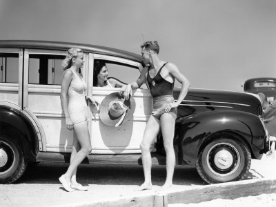 Men And Women In Bathing Suits In Front Of 1938 Ford Station Wagon by H. Armstrong Roberts Pricing Limited Edition Print image
