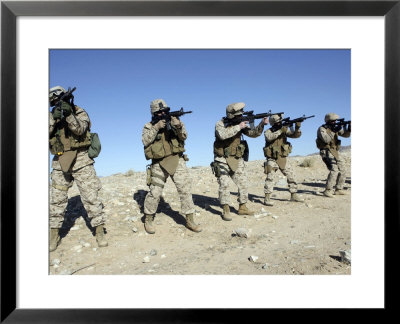 Military Transistion Team Members Quickly Reload Their Rifles by Stocktrek Images Pricing Limited Edition Print image