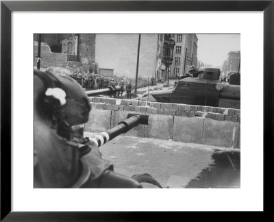 U.S. Tank With Gum Aimed At E. German Military Vehicle On Other Side Of Wall by Paul Schutzer Pricing Limited Edition Print image