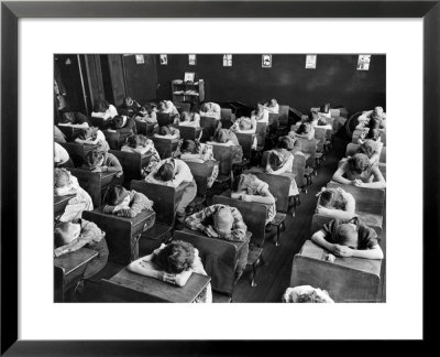 Elementary School Children With Heads Down On Desk During Rest Period In Classroom by Alfred Eisenstaedt Pricing Limited Edition Print image