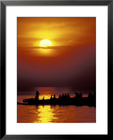Boat At Sunset On Lake Tanganyika, Tanzania by Kristin Mosher Pricing Limited Edition Print image