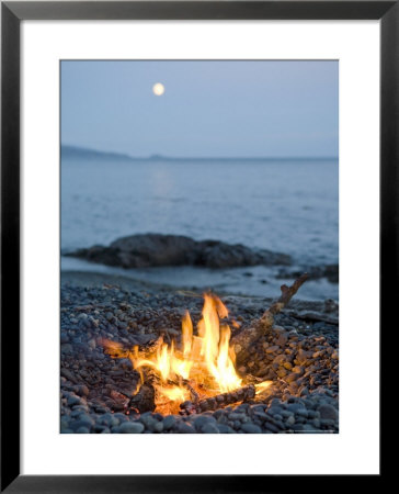 Campfire On A Beach With A Full Moon Visible by Taylor S. Kennedy Pricing Limited Edition Print image