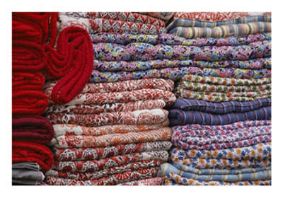 Quilts In A Kathmandu Market, Nepal by Michael S. Lewis Pricing Limited Edition Print image