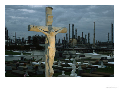 A Petrochemical Plant Looms In The Background Behind A Stone Crucifix by Ira Block Pricing Limited Edition Print image