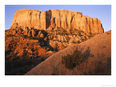 Evening Light Falls On A Butte On Georgia Okeefes Ghost Ranch by Stephen St. John Pricing Limited Edition Print image