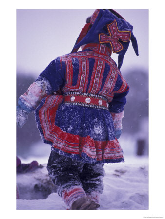 Lapp Child In Traditional Dress, Lappland, Finland by Nik Wheeler Pricing Limited Edition Print image