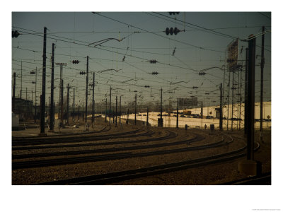 Train Tracks Under A Mesh Of Wires by Todd Gipstein Pricing Limited Edition Print image