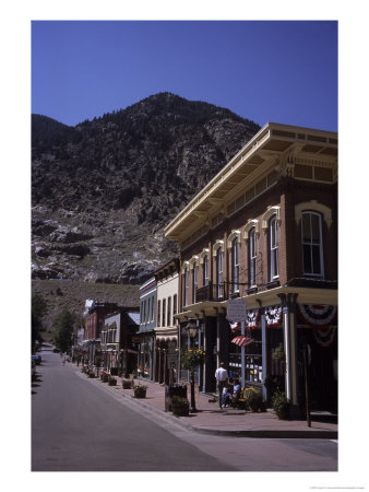 A Classic Western Downtown Street With Mountains Looming In The Back, Georgetown, Colorado by Taylor S. Kennedy Pricing Limited Edition Print image