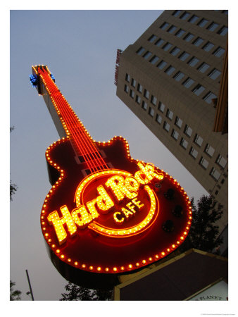 A Colorful Sign Advertising The Hard Rock Cafe Restaurant by Richard Nowitz Pricing Limited Edition Print image