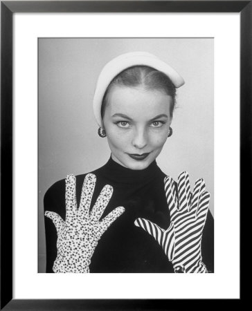 Model Martha Boss, Modeling Mismatched Gloves by Nina Leen Pricing Limited Edition Print image