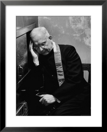 Polish American Catholic Priest Hearing Confession by John Dominis Pricing Limited Edition Print image