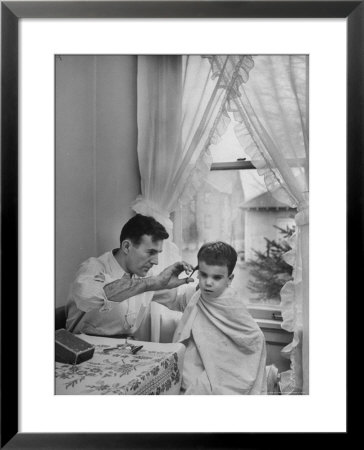 B.F. Goodrich Engineer Frank Herzegh Developed The Tubeless Tire, Cutting His Son Frankie's Hair by Alfred Eisenstaedt Pricing Limited Edition Print image