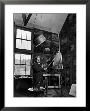 Former Pm Winston Churchill Smoking A Cigar In His Studio Dressed In His Blue Raf Siren Jump Suit by Hans Wild Pricing Limited Edition Print image