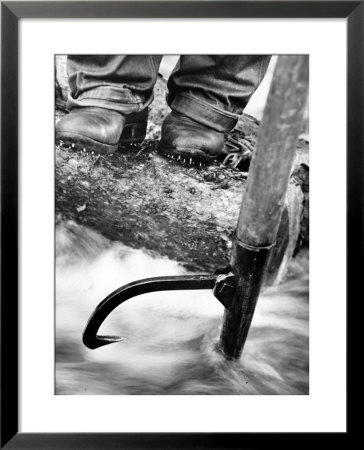 Log Driver's Feet Using A Peavey, To Control Lumber Floating Down River Headed For Paper Mill by Margaret Bourke-White Pricing Limited Edition Print image