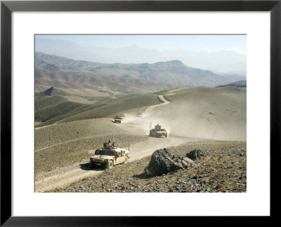 Humvees Traverse Rugged Mountain Roads by Stocktrek Images Pricing Limited Edition Print image