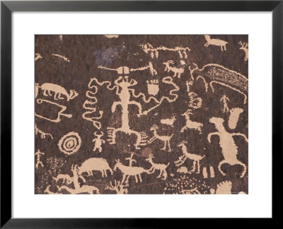 Indian Petroglyphs Drawn On Red Standstone By Scratching Away Dark Desert Varnish Of Iron Oxides by Tony Waltham Pricing Limited Edition Print image