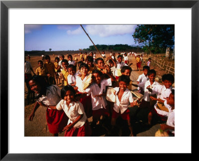 Playtime For School Children Of Watu Karere, Sumba, East Nusa Tenggara, Indonesia by Paul Kennedy Pricing Limited Edition Print image